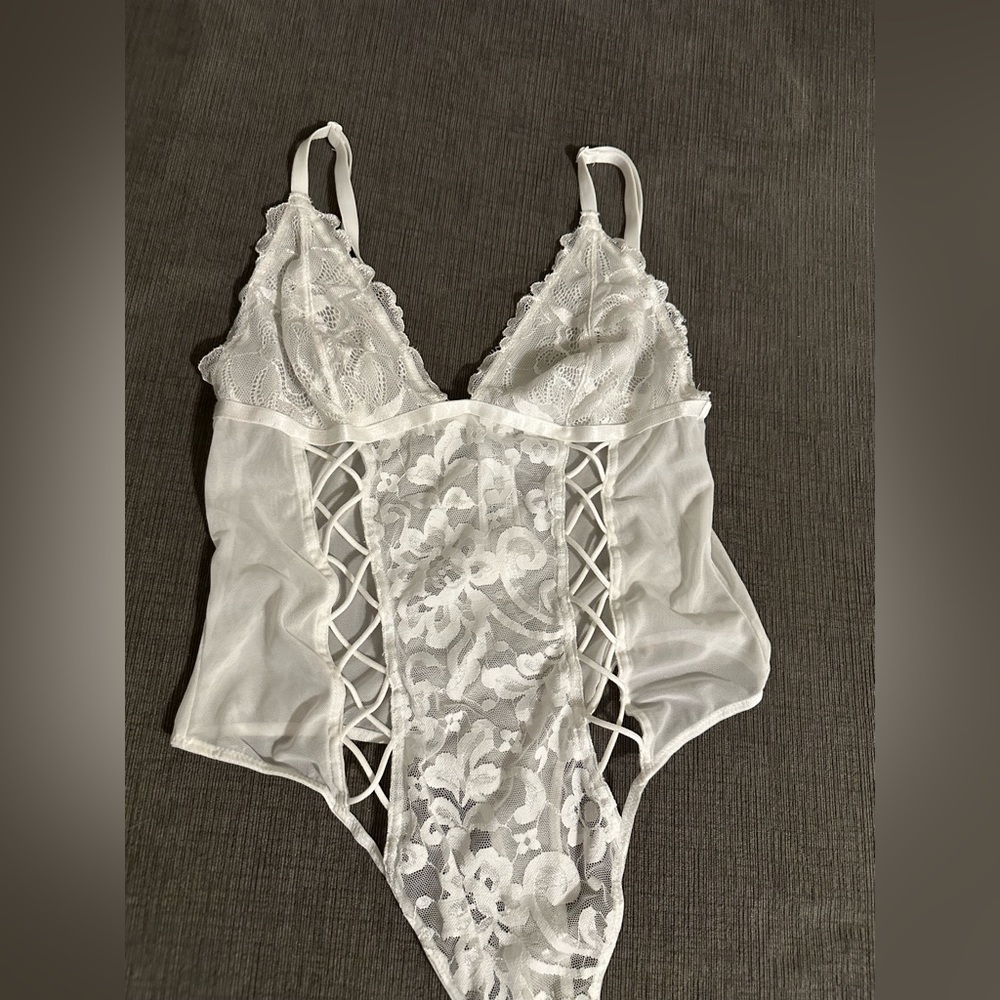 Sexy white lace body suit.